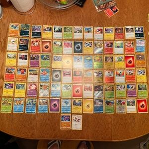 Lot of 80 Pokémon Cards including one Charizard!